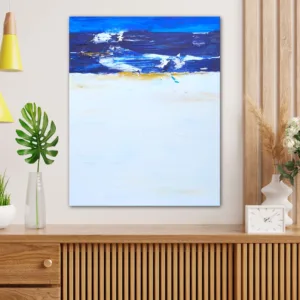Original Wave Art with blue, yellow, and white hung above a brown console